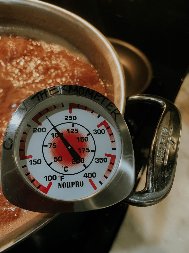 Candy thermometer starting to reach 250 degrees Farenheight